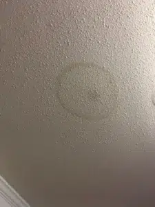 Water stains visible on the ceiling